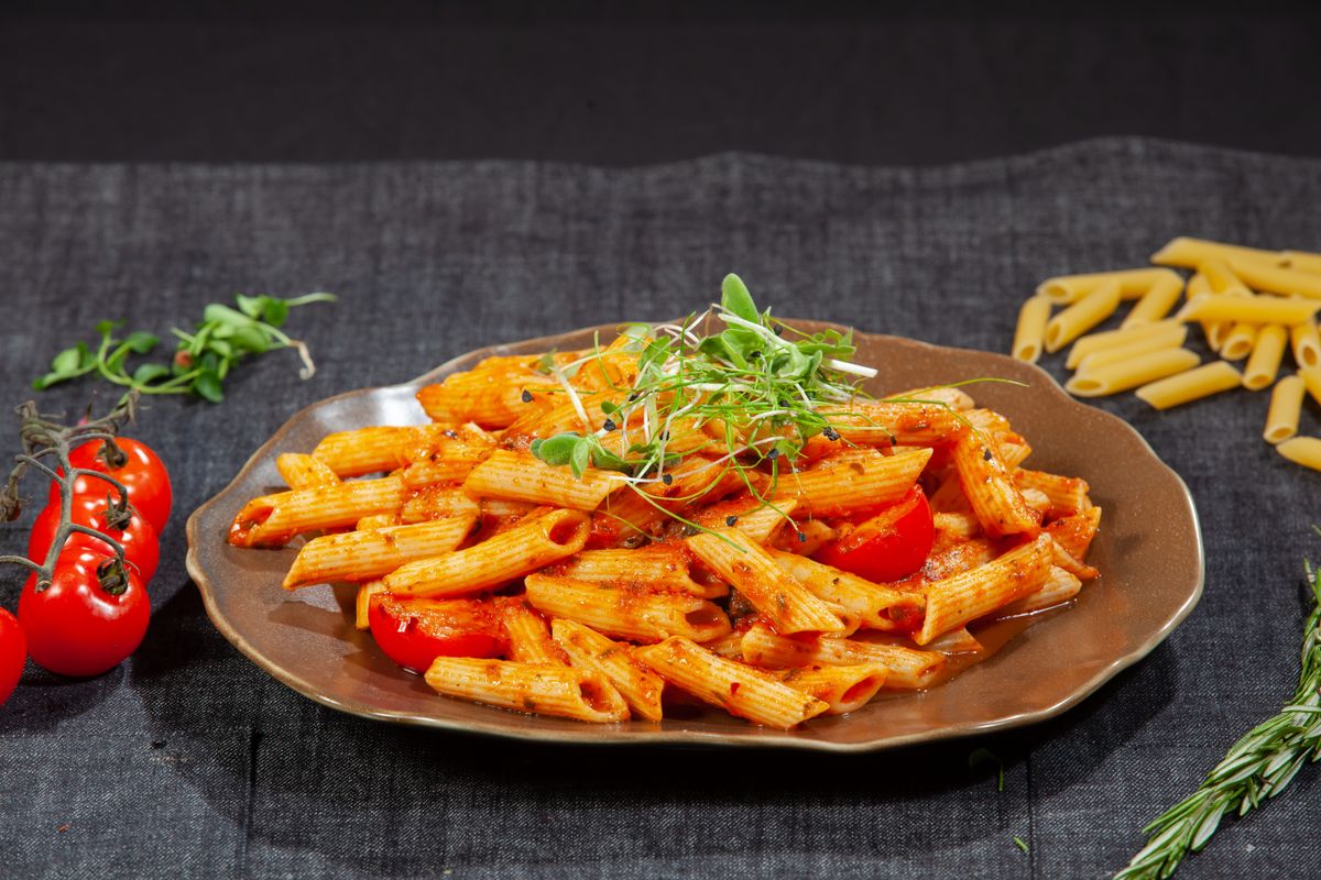 Penne pasta with tomato sauce; illustrative serving idea