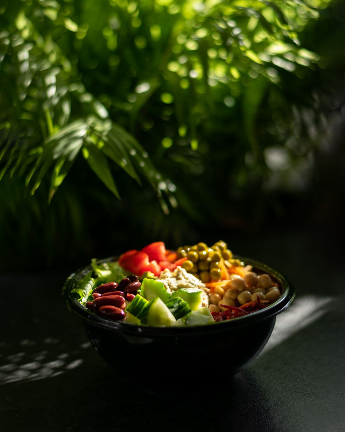 A salad bowl with mixed legumes and vegetables