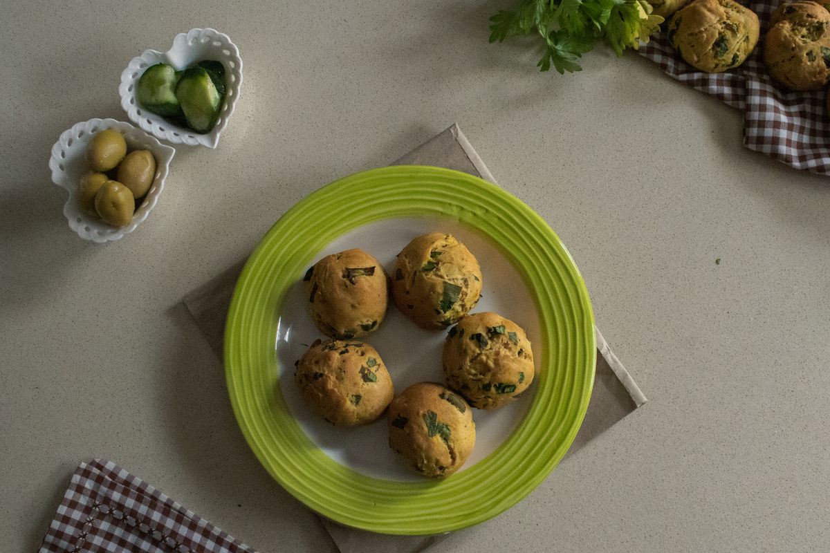 Savory muffins served with vegetables