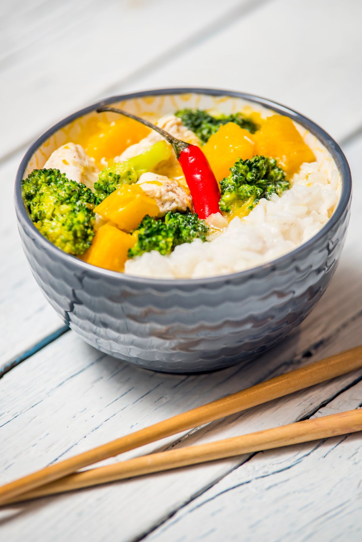 Rice and broccoli in a bowl; illustrative serving idea